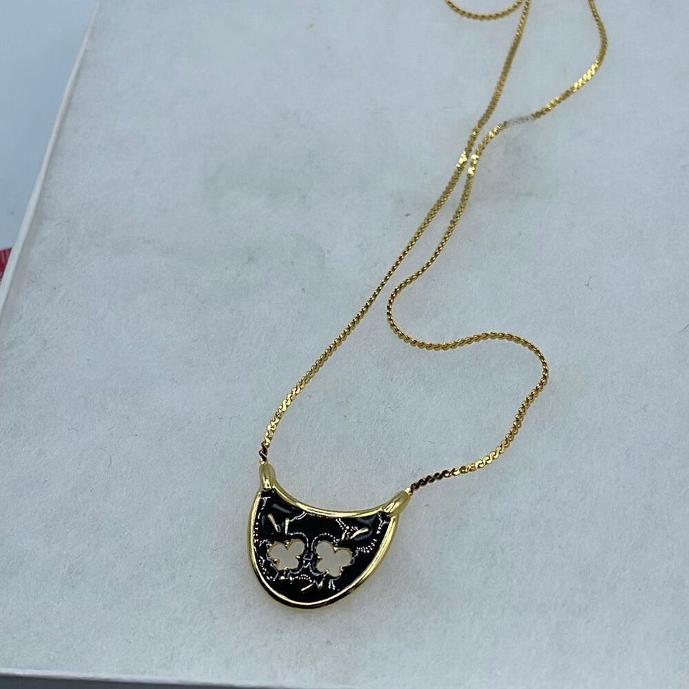 Vintage half moon butterfly cut out pendant gold tone chain.